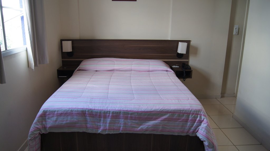 Astro Hotel double room with the bed in view